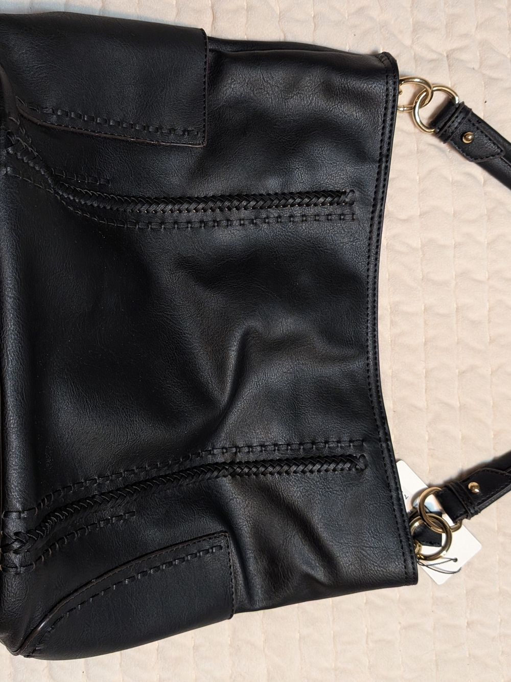 Sleek Black Leather Shoulder Bag with Braided Accents